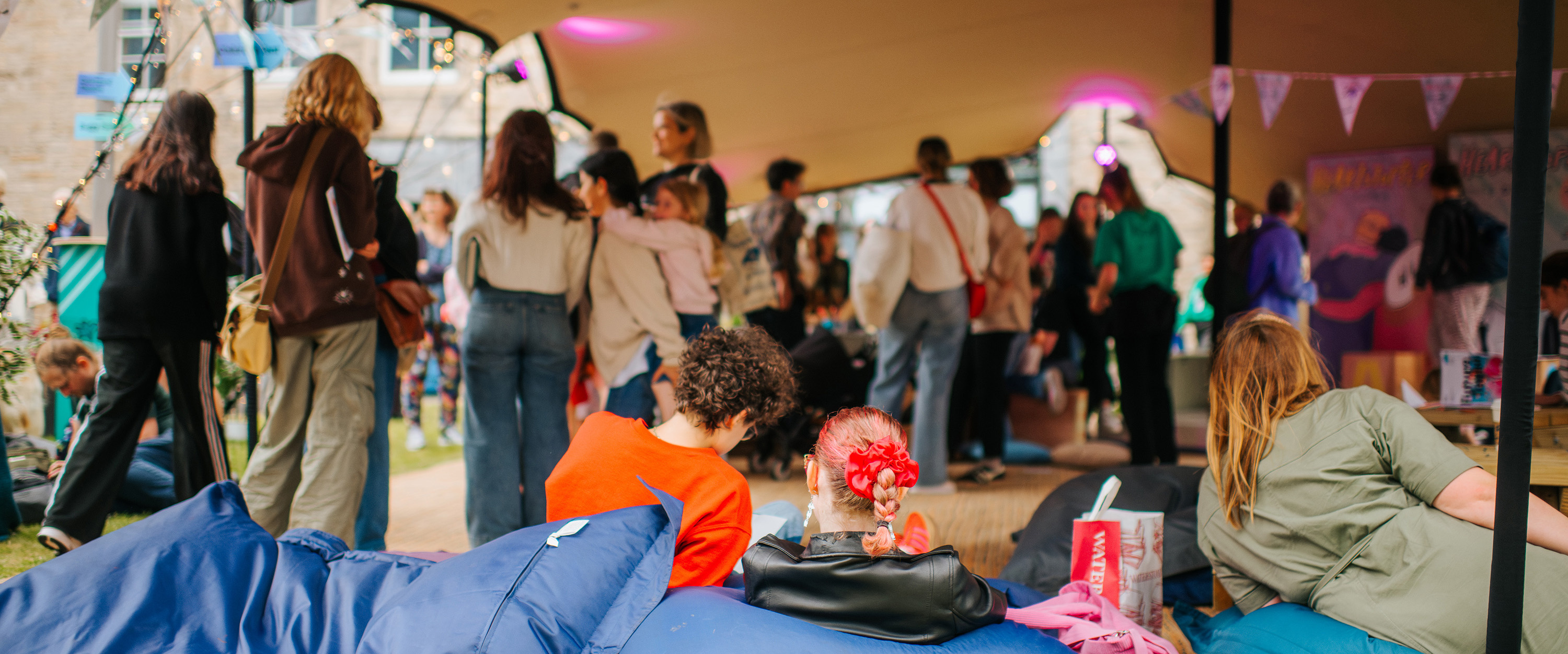 photo of Book Festival goers in tent