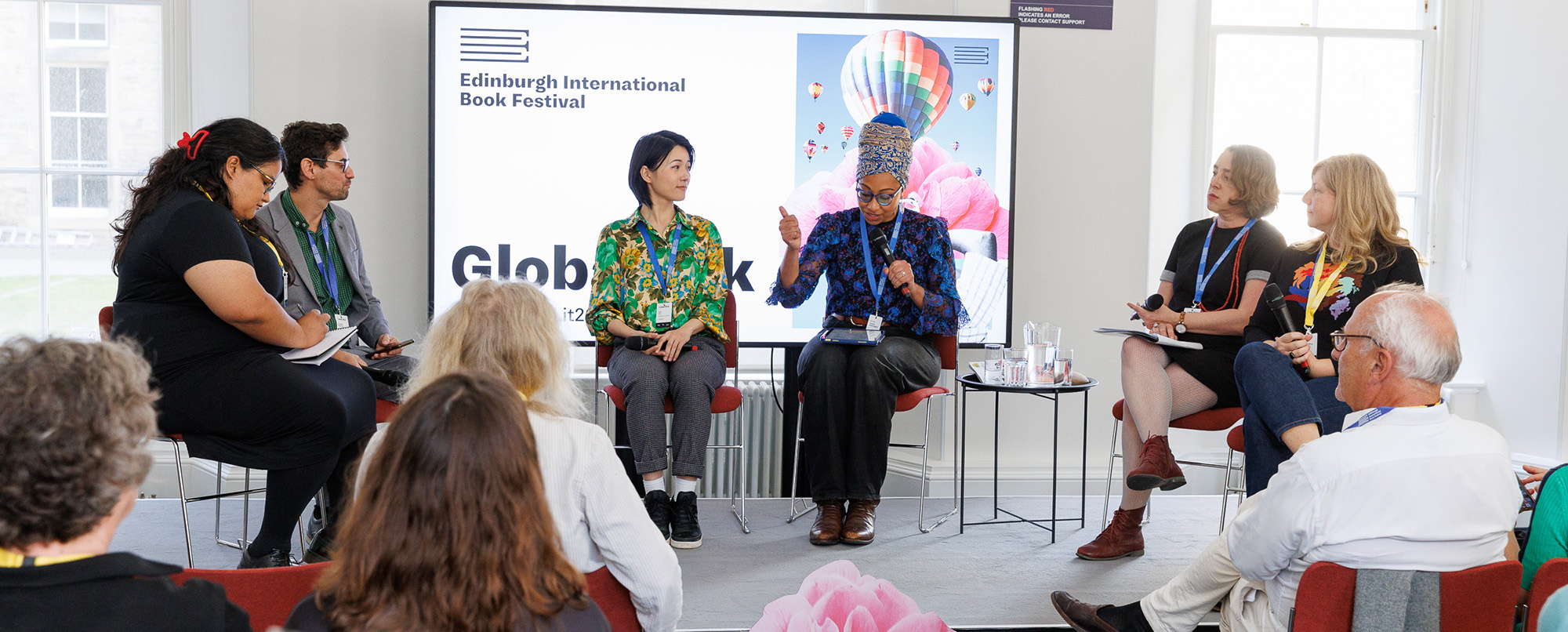 Image of speakers at 2024 Global Ink event at Edinburgh International Book Festival